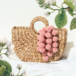 Best Summer Product 2026 Unisex Handmade Bags Cheap Wholesale Straw Bag High Quality Water Hyacinth Bag With Pompom - Product Image 1