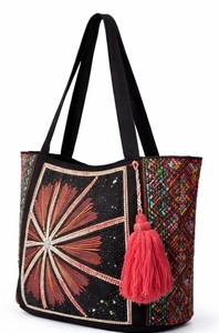 Bold <b>black</b> tote <b>bag</b> with intricate starburst beadwork, colorful side panels, and tassel accent. Perfect statement handbag - Product Image 2