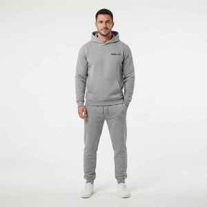 Ensemble de survêtement gris à capuche pour homme, sweat-shirt et pantalon décontractés à longueur intégrale avec poches latérales, couleur unie, coupe classique, vêtements d'automne - Product Image 1