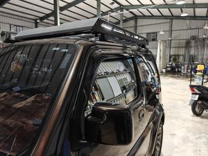 แผ่นบังแดดกันฝนสำหรับรถยนต์ Suzuki Jimny ปี 1998-2018 รุ่น GCS ผลิตจากอะคริลิกพร้อมเทปกาวสองหน้า รุ่น SZ637 - Product Image 4