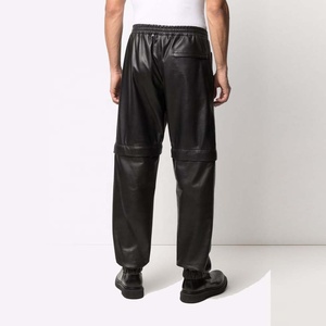 Pantalones ajustados de cuero con logotipo personalizado para hombre, impermeables, resistentes al viento, de cintura media, brillantes y a la moda, para actuaciones de bandas de rock. - Product Image 4