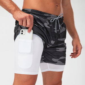 กางเกงวิ่งออกกำลังกายผู้ชายคุณภาพสูงพร้อมโลโก้สั่งทำพิเศษ แบบ 2 in 1 มีกระเป๋าสำหรับฝึกซ้อม ผลิตจากโพลีเอสเตอร์ 100% แห้งเร็ว ระบายอากาศได้ดี - Product Image 1