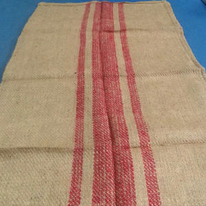 กระสอบป่านใหม่ 100% สีแดงลายทาง ขนาด 120x70 ซม. สำหรับบรรจุข้าว ข้าวโพด โกโก้ เม็ดมะม่วงหิมพานต์ เป็นมิตรกับสิ่งแวดล้อม ย่อยสลายได้เอง รับทำโลโก้ตามสั่ง - Product Image 1