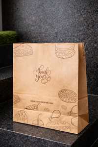 ถุงกระดาษกระดาษคราฟท์ SOS สีน้ำตาลนำเข้าพร้อมพื้นตาราง100 GSM - Product Image 1