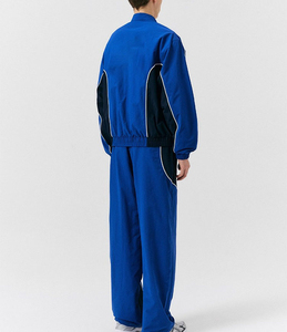Ensemble de survêtement pour homme, bleu, à blocs de couleur, en polyester tricoté, respirant, col montant, style sportif décontracté, coupe-vent, en vente en ligne - Product Image 6