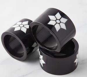 Modern <b>Black</b> Plastic <b>Napkin</b> Ring With White Geometric Flower Design For Elegant Table Decoration Use - Product Image 2