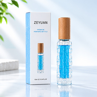Flacon de parfum en verre de 10 ml avec bouchon en bois, atomiseur de parfum texturé en relief avec emballage en boîte, vente en gros
