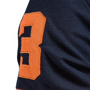 Polo de manga corta azul marino para hombre con cuello y puños naranjas, logotipo de jirafa bordado, diseño casual sólido y transpirable - Product Image 4