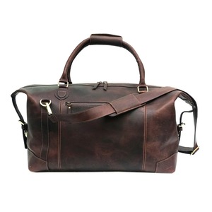 กระเป๋าหนังแท้ลายวินเทจ กระเป๋าเดินทางสุดสัปดาห์สไตล์เรียบง่ายสำหรับผู้ชายและผู้หญิง ความจุขนาดใหญ่ น้ำหนักเบา มีซิป พกพาสะดวก - Product Image 1