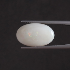 โอปอลสีขาวธรรมชาติ พลอยหลวม 5.17 กะรัต รูปทรงวงรี 18x11 มม. รับรองโดย IGI ขัดเงาด้วยมือ ลงแว็กซ์/น้ำมัน ขายส่งเครื่องประดับ - Product Image 1