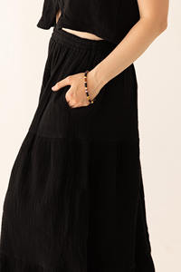 Jupe longue maxi en gaze de coton noir style bohème, triple couche de mousseline, avec poche, taille élastique, adaptée à la maternité, au prix d'usine - Product Image 3