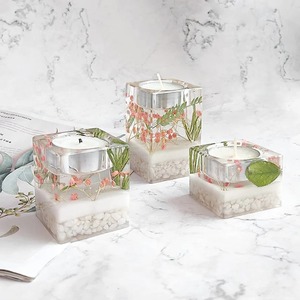 Modern Design Rosin & Handmade Round Shape 4x4 Inch Florals Pattern Candlestick Holder for Home Office and Hotel Use - Product Image 1