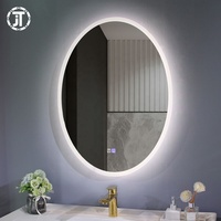 Miroir de salle de bain LED de forme ovale pour la décoration d'hôtel, miroirs de salle de bain fantaisie sur mesure ODM
