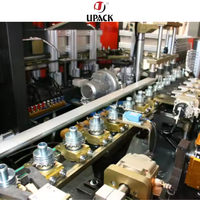 Machine de soufflage par injection semi-automatique à 4 cavités, moteur Mitsubishi PLC 50 kW pour bouteilles d'eau minérale en PET/PC/PP/SMC