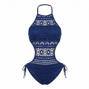 Traje de baño azul de una pieza con cuello halter para mujer, con diseño geométrico calado y lazos laterales - Product Image 1