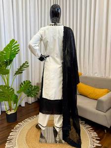 ชุดสูทผ้าเครปเนื้อหนักปักลายด้วยด้ายและเลื่อมอย่างประณีต พร้อมผ้าคลุมไหล่แบบดั้งเดิม - Product Image 5