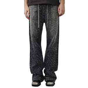 Libérez votre diva intérieur avec nos jeans glamour taille haute ornés de cristaux fins sur ce pantalon en denim à strass. - Product Image 1