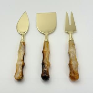 Producto de Moda: Juego de Queso Dorado Metálico con Mango de Resina Negra para Mesa de Desayuno, Juego de Espátulas para Queso y Mantequilla - Product Image 1