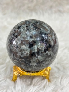Yooperlite <b>sphere</b> with smoky gray stone body vibrant orange fluorescent glow polished curvature and distinctive mineral display - Product Image 4