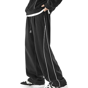 Pantalon de survêtement en molleton épais noir délavé pour homme, avec bande latérale blanche, taille élastique et cordon de serrage, coupe décontractée ample, idéal pour l'automne - Product Image 1