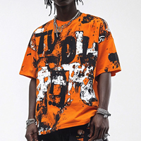 T-shirt streetwear orange pour homme, coupe classique, manches courtes, motif lettres imprimées effet gouttelettes sur le devant, en jersey de coton tricoté, col rond