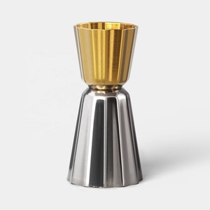 Jigger à double face en acier inoxydable bicolore or et argent, outil de mesure de précision pour cocktails au design élégant - Product Image 1
