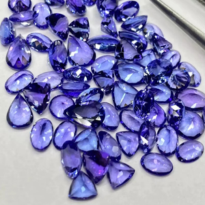 พลอยแทนซาไนต์ธรรมชาติ AA เกรดพรีเมียมหายาก สีฟ้าเหลือบรุ้ง ขนาด 0.5-1.5 กะรัต ผ่านการรับรองจากผู้ตรวจสอบอิสระ ผ่านการอบความร้อน - Product Image 1