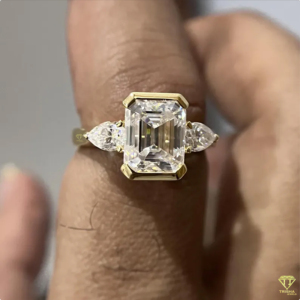Elegant <b>Emerald</b> Cut Lab Grown Diamond Engagement <b>Ring</b> With Pear Side Stones In Yellow Gold For Women - Product Image 5
