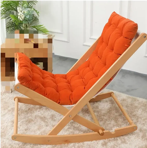 Fauteuil à bascule classique en chêne sculpté avec un dossier orné de motifs en spirale, un dossier à tiges et un siège en cuir brun foncé, en gros. - Product Image 4