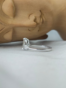 Pear Cut Diamond Ring Side <b>Stones</b> in White Gold a graceful blend of elegance and brilliance with radiant sparkle luxury - Product Image 2