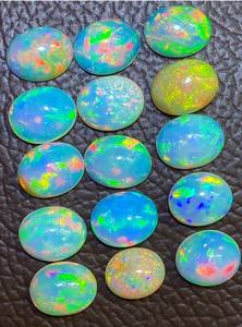 Piedra preciosa de ópalo etíope natural de 8x6 mm - Gemas de ópalo cabujón sueltas de forma ovalada - Piedras lisas con juego de color al por mayor - Product Image 4