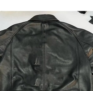 Veste d'hiver pour homme en cuir véritable de couleur unie, style streetwear, avec poches zippées sur le devant, tissu en toile imperméable et écologique - Product Image 4