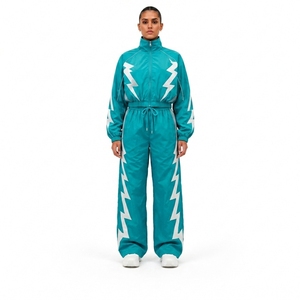 Survêtement unisexe bleu sarcelle avec imprimé zigzag blanc, coupe régulière, style sportif, col montant, fermeture éclair, coupe-vent et imperméable - Product Image 1