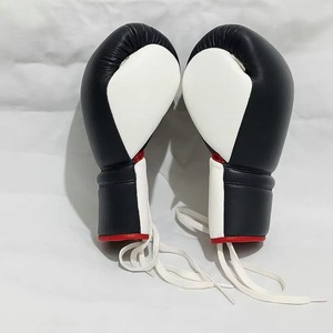 ถุงมือหนังวัวสำหรับฝึกซ้อม ขายส่งทุกขนาด สีและโลโก้สั่งทำได้ ชุดออกกำลังกายสำหรับชกมวย ผู้ผลิต OEM - Product Image 2