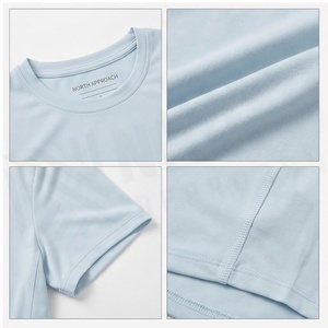 Camiseta Deportiva de Manga Corta con Cuello Redondo en Azul Claro, Estilo Nórdico, 100% Poliéster, Transpirable, Color Sólido, para Mujer - Product Image 4