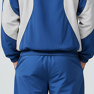 ชุดวอร์มกันลมสีน้ำเงินสำหรับผู้ชายขายดี แจ็คเก็ตคอสูงแบบซิปและกางเกงจ็อกเกอร์ ชุดกีฬาแห้งเร็ว รุ่น 2026 - Product Image 6
