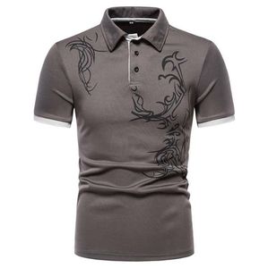 Men's <b>White</b> Short Sleeve <b>Polo</b> Shirt With Black Tribal Print Contrast Trim Slim Fit Casual Poplin T-Shirt - Product Image 2