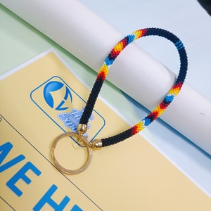 WE HERE EXPORTS Porte-clés de poignet tendance pour femme, fait main, avec perles de rocaille, pierres imitation perle et éléments à insérer pour ongles, cadeau bleu - Product Image 2