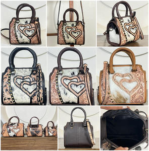 กระเป๋าหนังวัวแท้ลายแกะสลักด้วยมือ รุ่น Speedy Bag ประดับหัวใจ ดีไซน์เนอร์ สำหรับงาน March Expo 2026  แบบสะพายไหล่หรือถือได้ เหมาะสำหรับทุกเพศ - Product Image 3