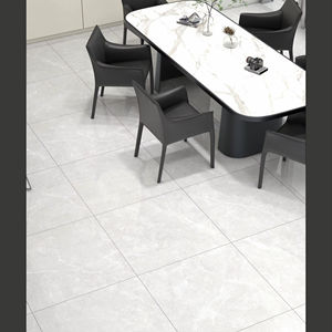 Azulejos de porcelana de geometría consistente de 600X600MM diseñados para mantener un ritmo uniforme en el suelo y una resistencia duradera en la superficie interior. - Product Image 1