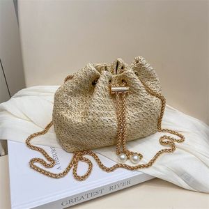 "Woven Women's <b>Bucket</b> <b>Bag</b> with <b>Pearl</b> Decoration and Drawstring Closure" - Product Image 1