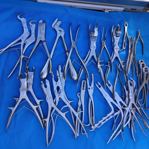 Lot of 33 Surgical Instruments, Cutters, Ronguers and Others. - Product Image 1