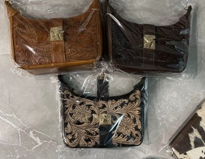Wholesale Handmade Genuine Leather Black & White <b>Hair</b> On Cowhide Crossbody Bag with Hand Tooled Floral Design Messenger Bags - Product Image 1