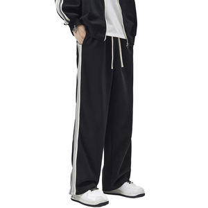 กางเกงลำลองผู้ชายลายทางทรงโอเวอร์ไซส์ สวมใส่สบาย ทรงหลวม เอวกลาง สตรีทแวร์ ระบายอากาศได้ดี ผ้าคอตตอนผสม ชุดลำลองสไตล์สปอร์ต สำหรับวัยรุ่น - Product Image 1