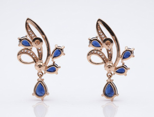 Boucles d'oreilles pour femmes en argent 925 plaqué or rose avec pierre bleue et moissanite - Product Image 1