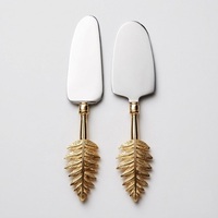 Cuillère de service vintage avec poignée papillon, compatible lave-vaisselle, en métal, finition mate, design décoratif