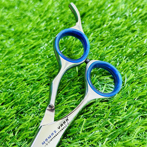 Tijeras de Peluquería Profesionales de Acero Inoxidable, con Mango Ergonómico de Acero Inoxidable y Elegante Reposa Dedos Azul - Product Image 5