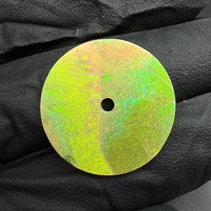 หน้าปัดนาฬิกาโอปอลสังเคราะห์ ขนาด 31.50 มม. ขัดเงาด้านเดียว หนา 0.7 มม. รูตรงกลาง 2 มม. a K Gems GMC-1008W - Product Image 1