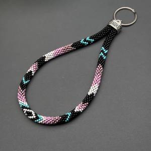 เราจำหน่ายสินค้าส่งออก เชือกคล้องมือประดับมุกเทียมทำมือสำหรับผู้หญิง ดีไซน์ทันสมัย สีชมพู เทอร์ควอยซ์ ดำ ขาว ลายเงิน - Product Image 3