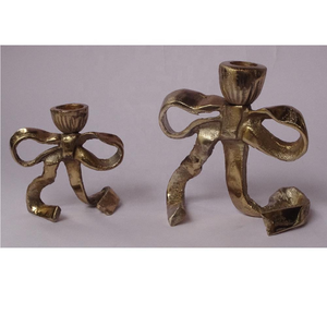 Porte-bougie en métal élégant en forme de nœud, finition dorée brillante, pour la saison des fêtes, centre de table pour mariage, décoration de la maison - Product Image 1
